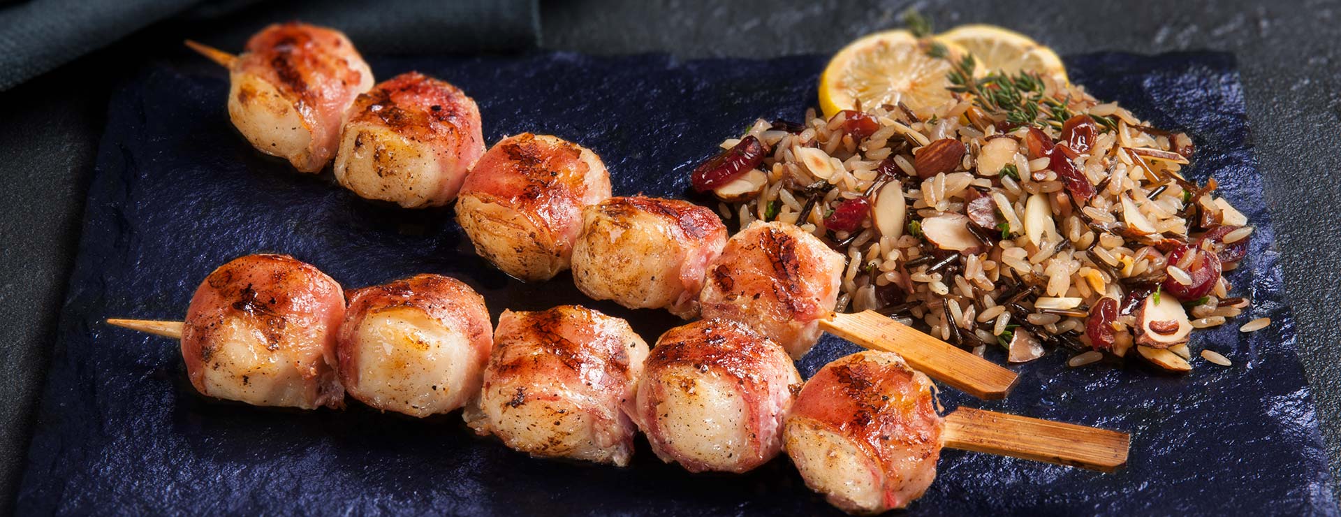 Bacon Wrapped Scallops Skewers served with Rice Pilaf